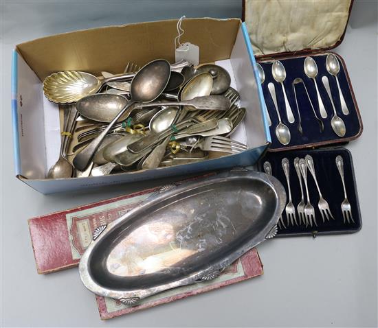 A collection of silver and plated flatware